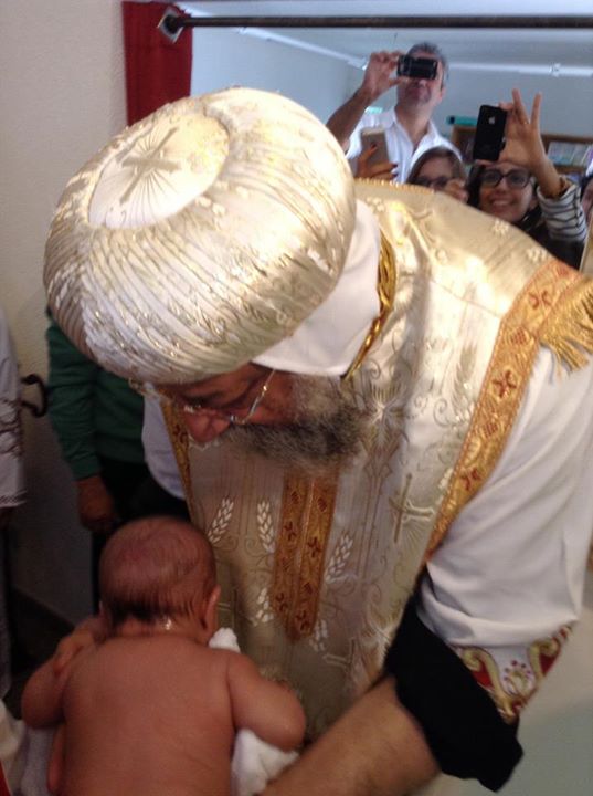 Pope baptizes two children in Switzerland